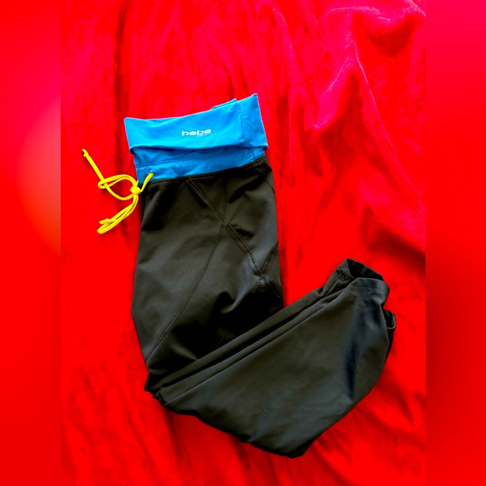 BEBE Sport fold over blue and black with yellow tie work out crop size small